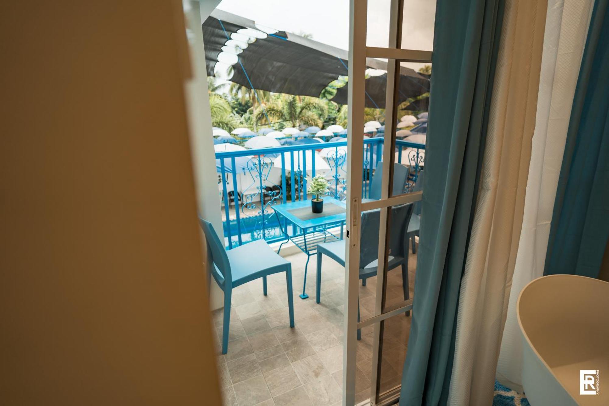 Bernese Resort Hotel Powered By Cocotel Ligao Chambre photo